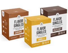 FLAVOR SINGLES three flavor packets laid out showing travel-ready convenience