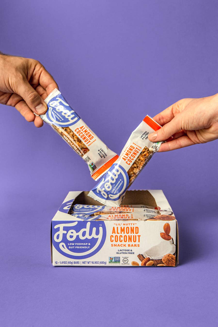 Fody individually wrapped bars inside a tote demonstrating portable low-FODMAP snack convenience