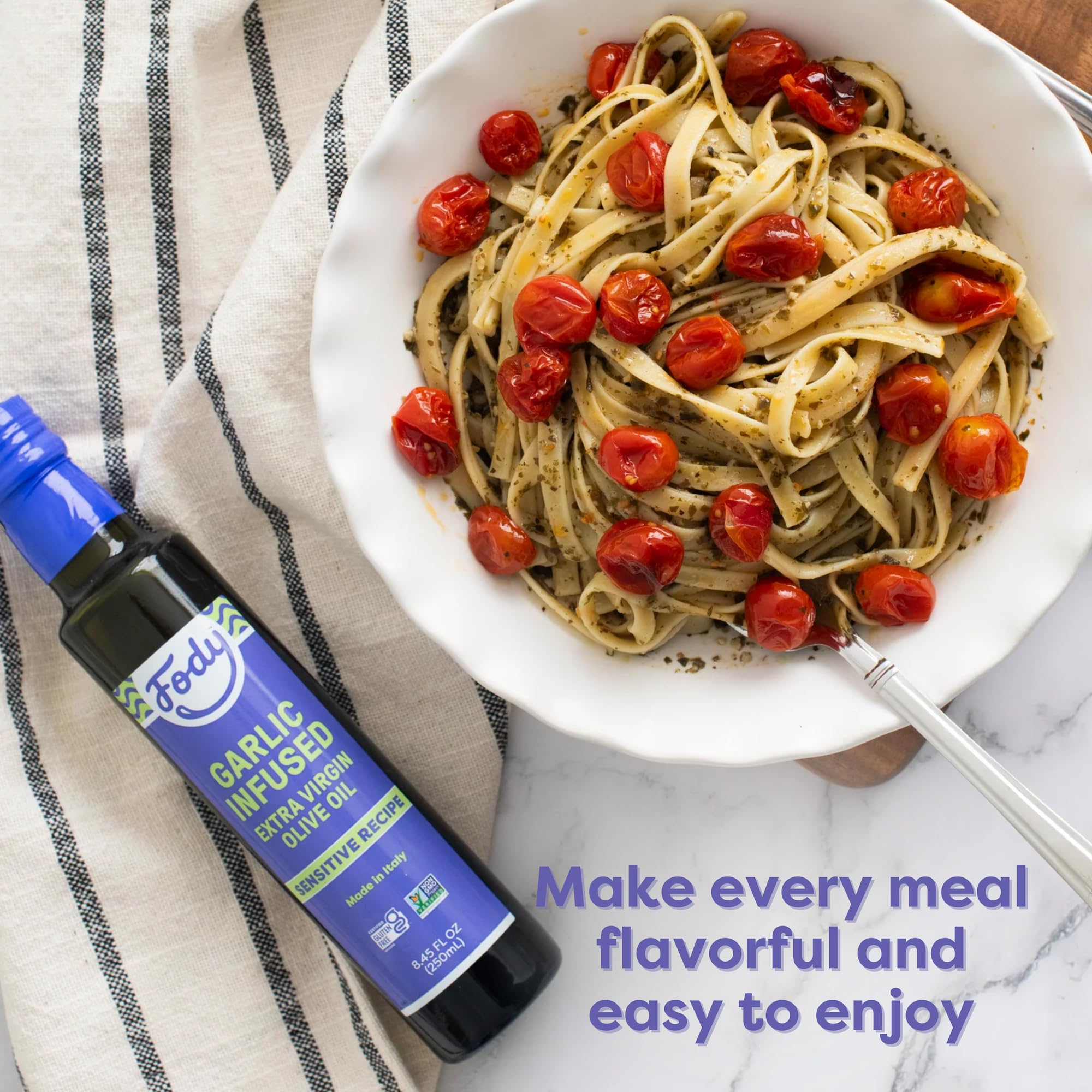 Fody oil drizzled over pasta demonstrating savory finishing benefit