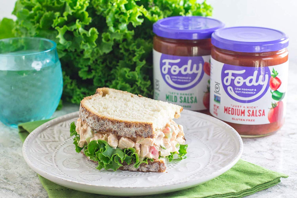 Fody mild salsa spoonful texture showing chunky tomatoes and mild spice