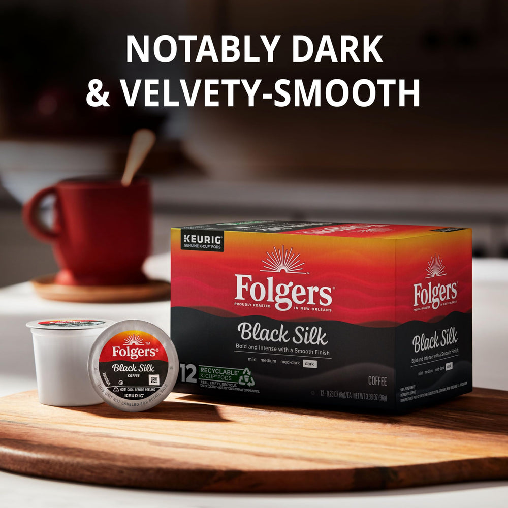 Texture of Folgers Black Silk coffee grounds emphasizing rich dark-roast aroma