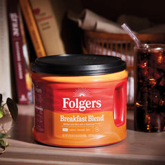 Spoon of Folgers ground coffee showing texture for consistent brewing