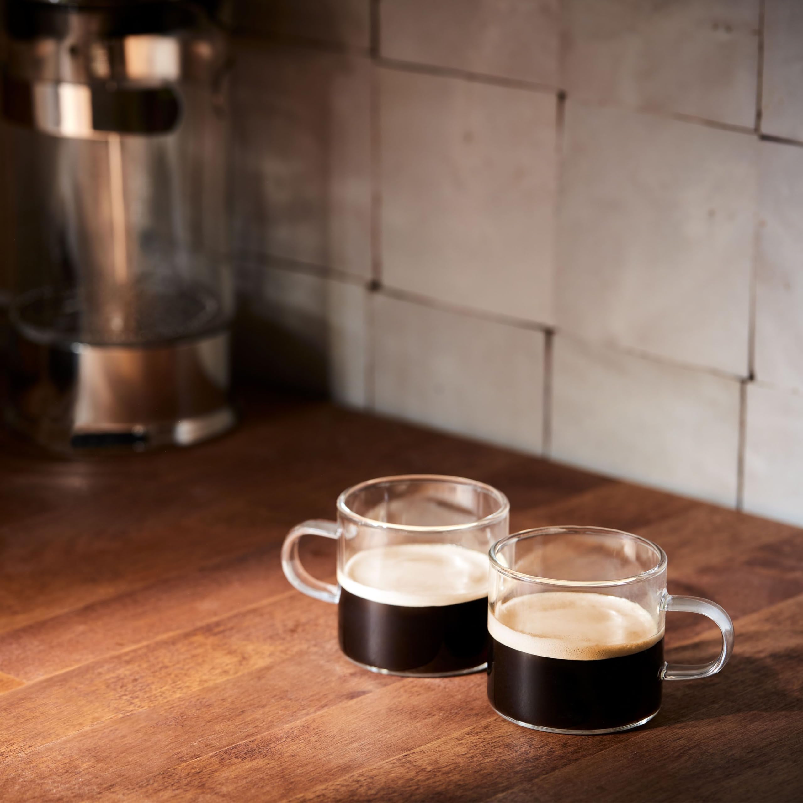 Ground coffee pouring into filter demonstrating easy brewing with Folgers