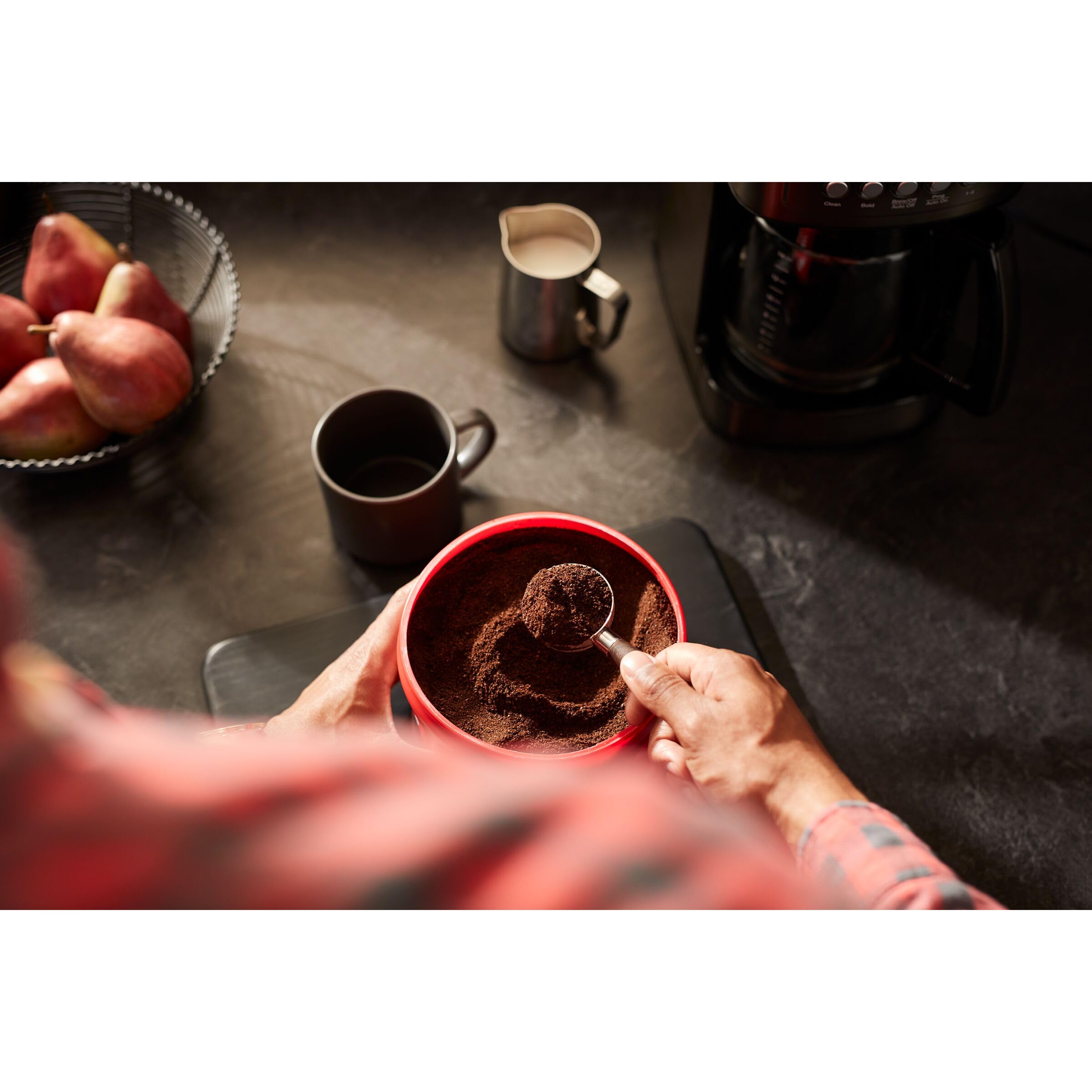Folgers House Blend cold-brew setup showing grounds steeping for smooth taste