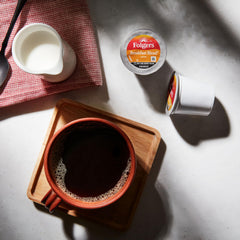 Folgers pod in Keurig brewer demonstrating fast, dependable brewing