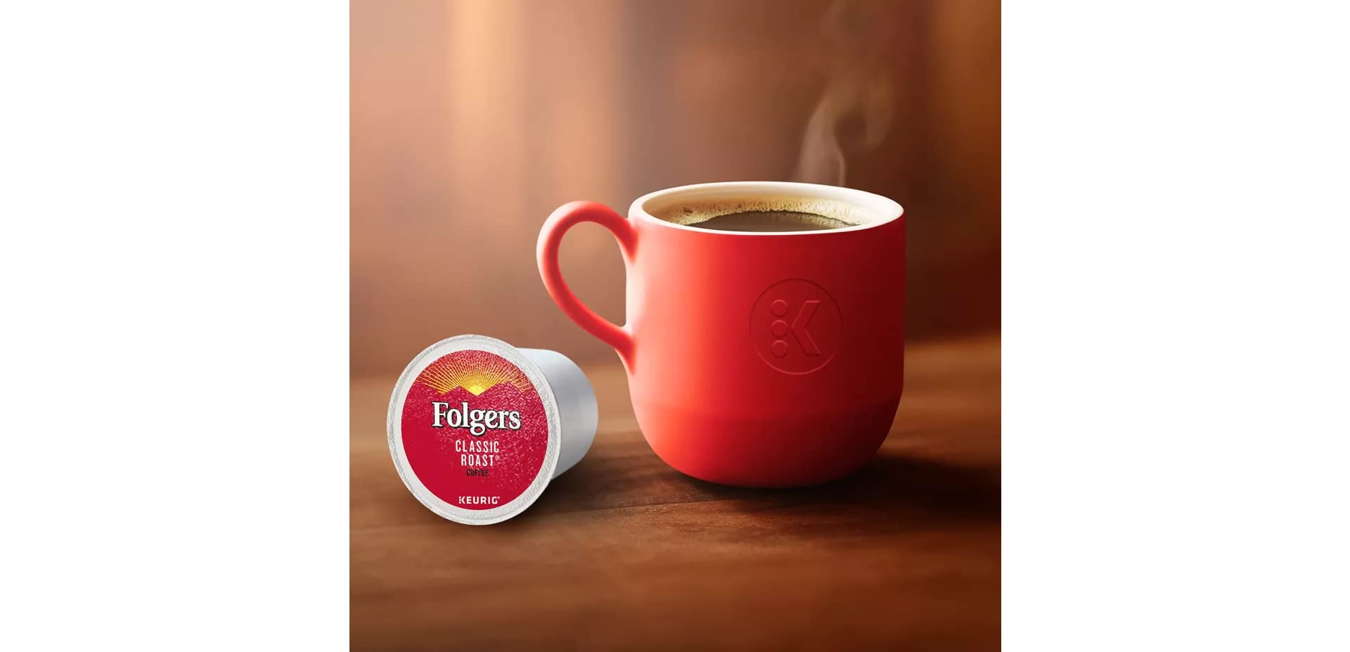 Hand holding Folgers K-Cup for scale and quick single-serve convenience