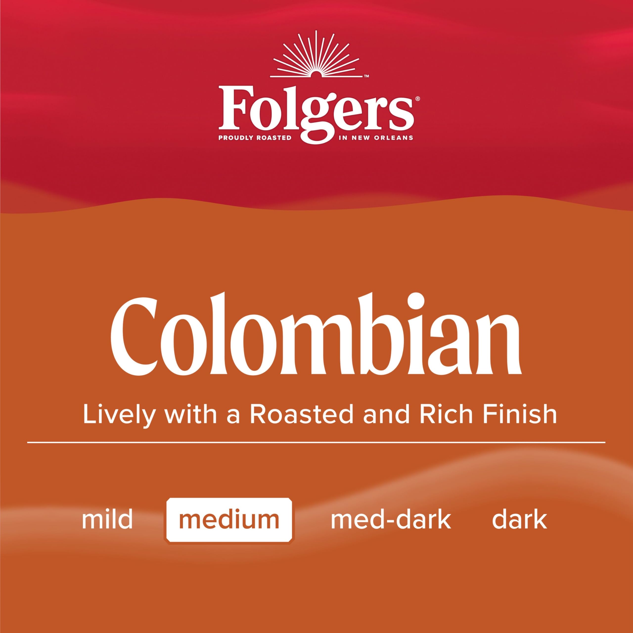 Hand holding a Folgers K-Cup pod beside a mug for size comparison and portion control