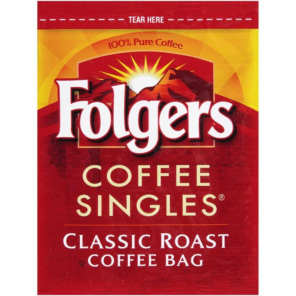 Folgers packets beside a cup and ruler showing packet size and easy storage
