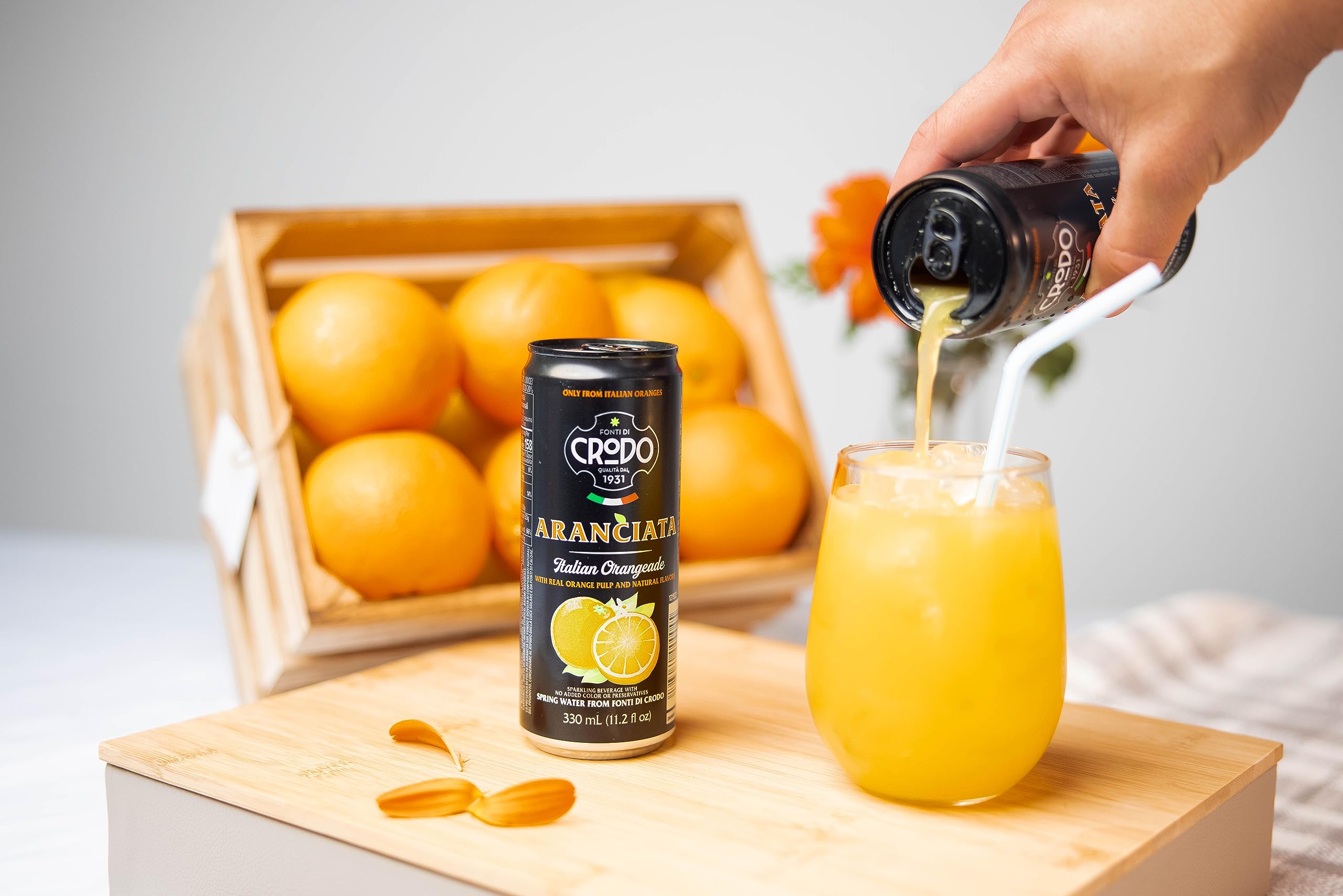 Close-up of Fonti Di Crodo orange pulp texture showing real fruit inclusions and freshness