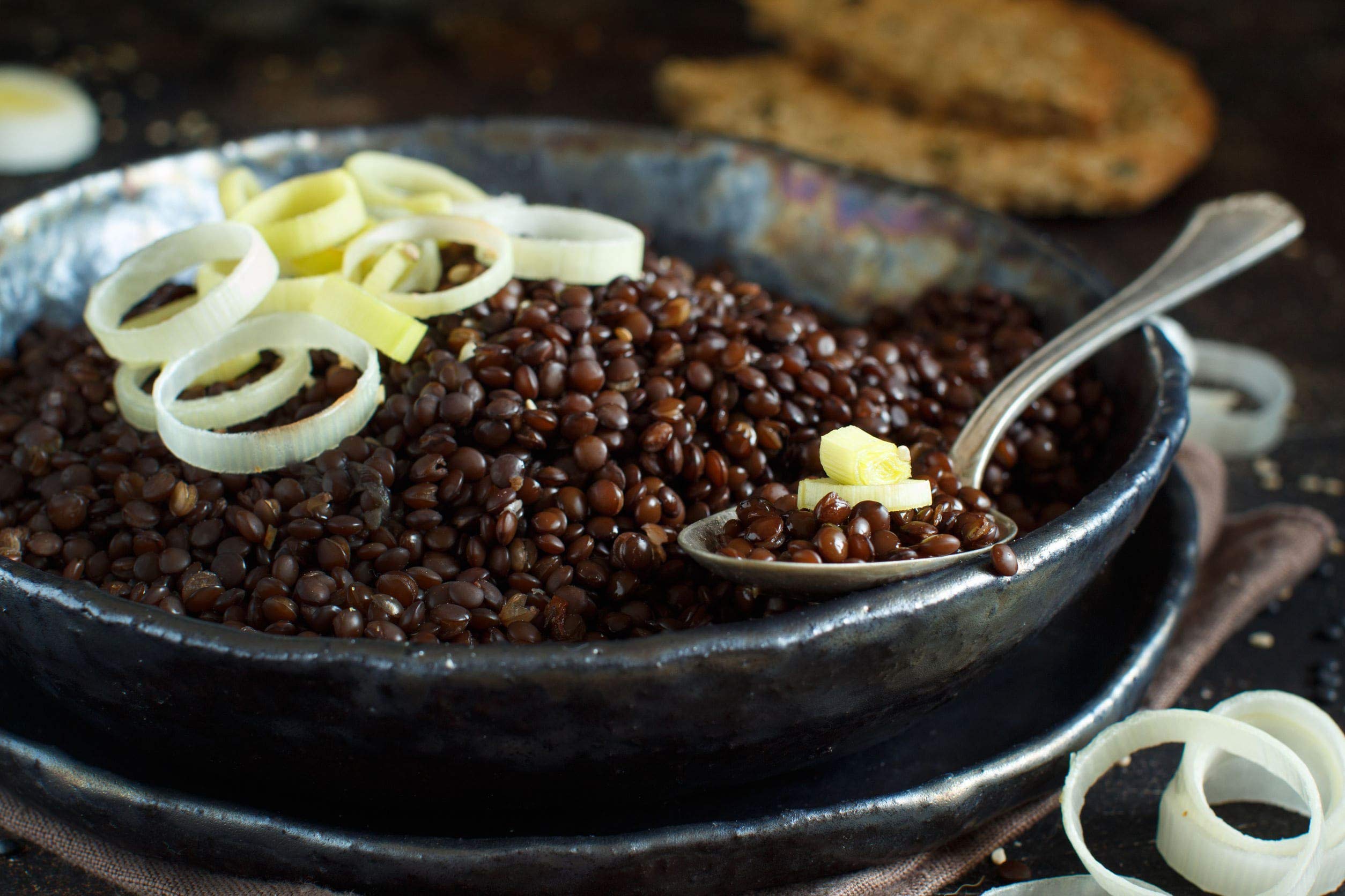 Food to Live lentils in measuring cup illustrating portion size and pantry storage