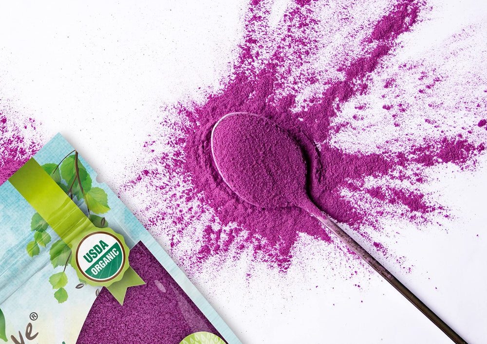 Food to Live powder scooped into spoon for easy measuring and use