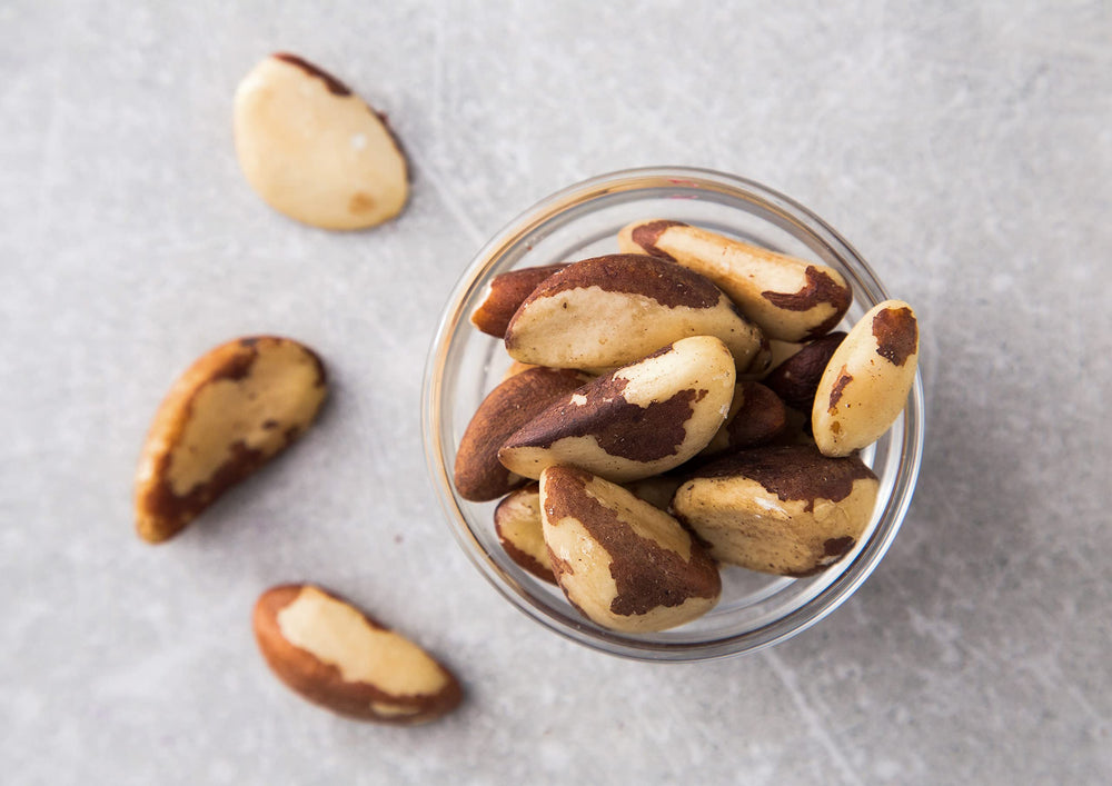 Food to Live sliced Brazil nut detail highlighting size and roasting finish