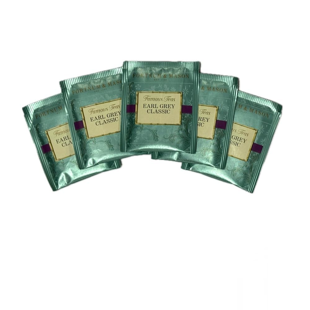 Fortnum & Mason box beside a teacup for size and portion comparison convenience