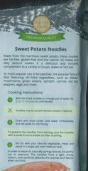Close-up of Four Elephants noodles texture highlighting chewy translucent strands and quality