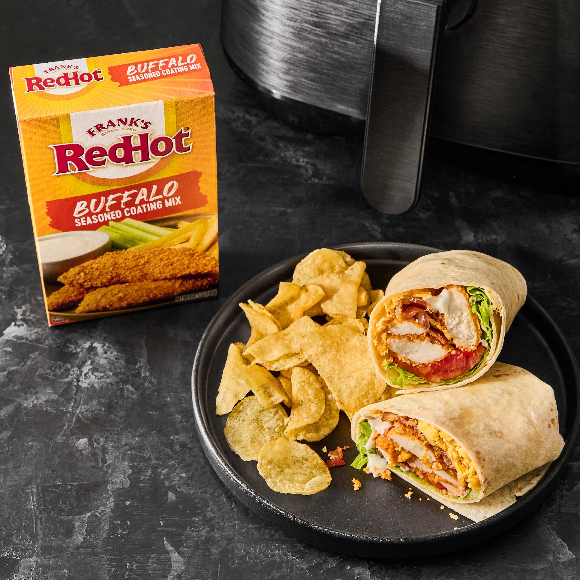 Frank's RedHot sprinkled over baked macaroni and cheese for crunchy Buffalo topping