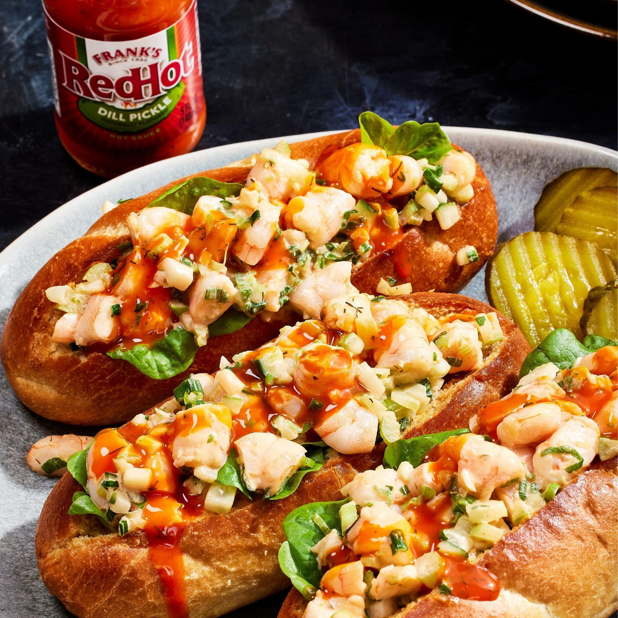 Frank's RedHot spread on sandwich illustrating dill pickle taste enhancement