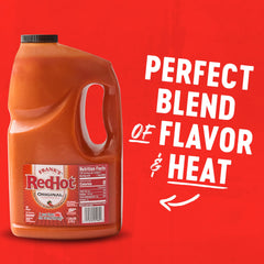 Frank's RedHot jug being poured into a dispenser for fast kitchen service