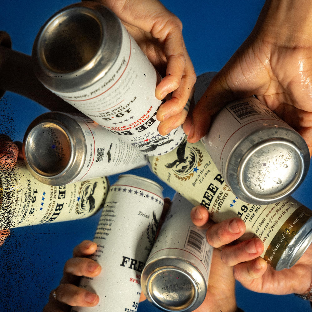 Free Bird cans in a picnic setting showing convenience for outdoor events