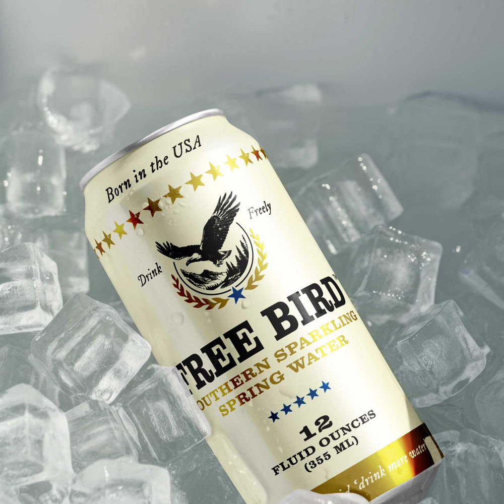 Free Bird sparkling water poured into glass showing bubbles and refreshing benefit