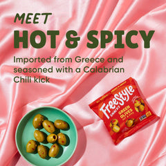 Freestyle Snacks olives poured on salad adding Mediterranean flavor and convenience