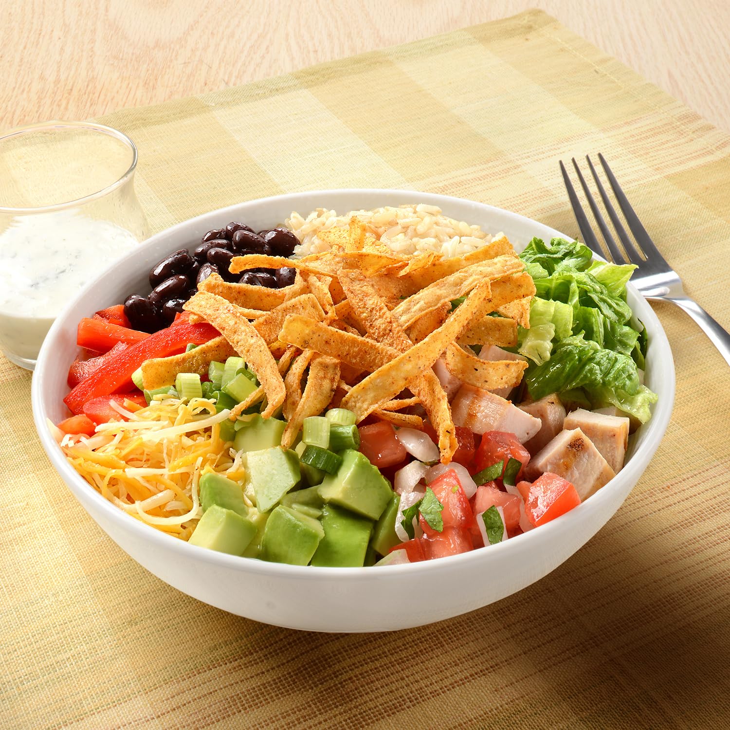 Fresh Gourmet salad topped with strips adding crunch and flavor appeal