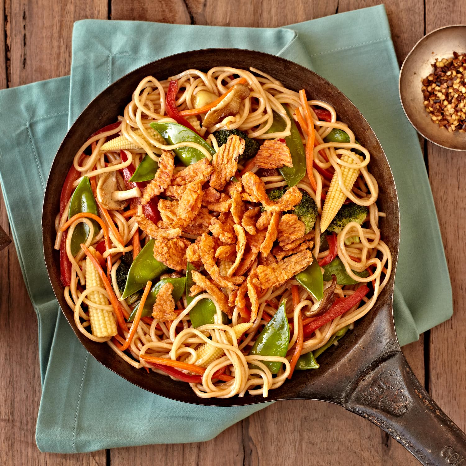 Fresh Gourmet crispy red peppers sprinkled on salad for instant texture boost