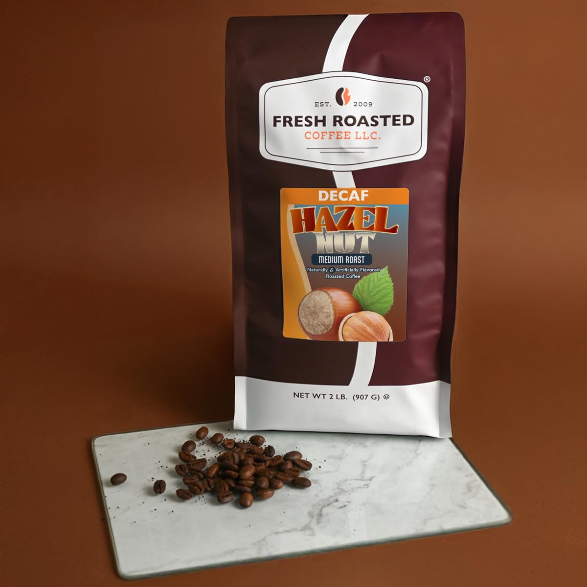 Fresh Roasted Coffee beans on a spoon portioned for grinding highlighting convenience