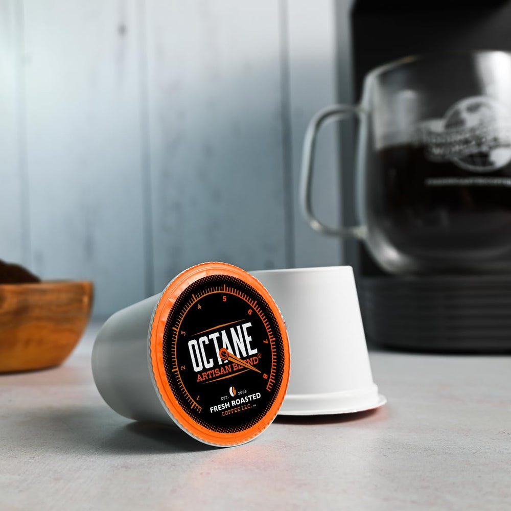 Fresh Roasted Coffee next to a mug for scale, demonstrating pod quantity per serving