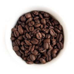 Fresh Roasted Coffee whole beans close-up highlighting even roast and aroma