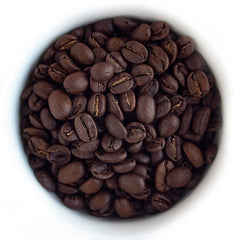 Fresh Roasted Coffee close-up of medium-roast Colombian beans highlighting even roast and aroma