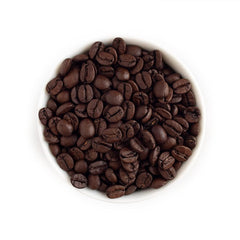 Fresh Roasted Coffee close-up of whole beans highlighting roast color and aroma