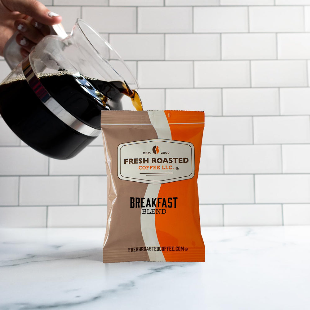 Filter attached to a Fresh Roasted Coffee pack, demonstrating ready-to-brew simplicity