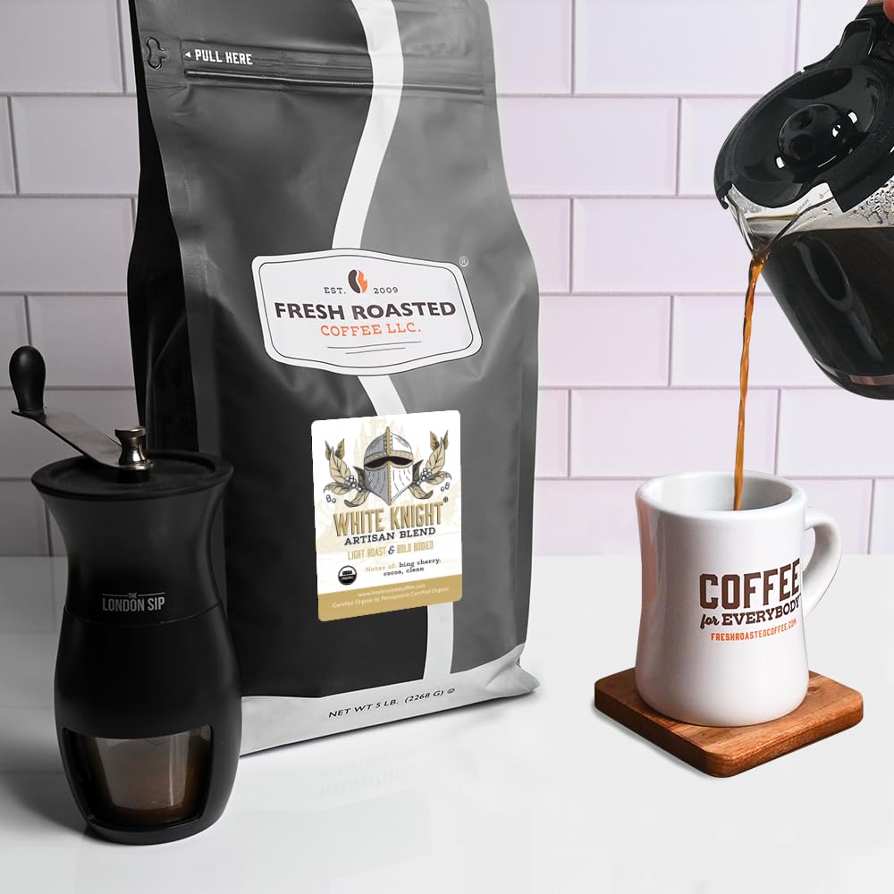 Fresh Roasted Coffee five-pound bag next to hand for scale, highlights bulk convenience