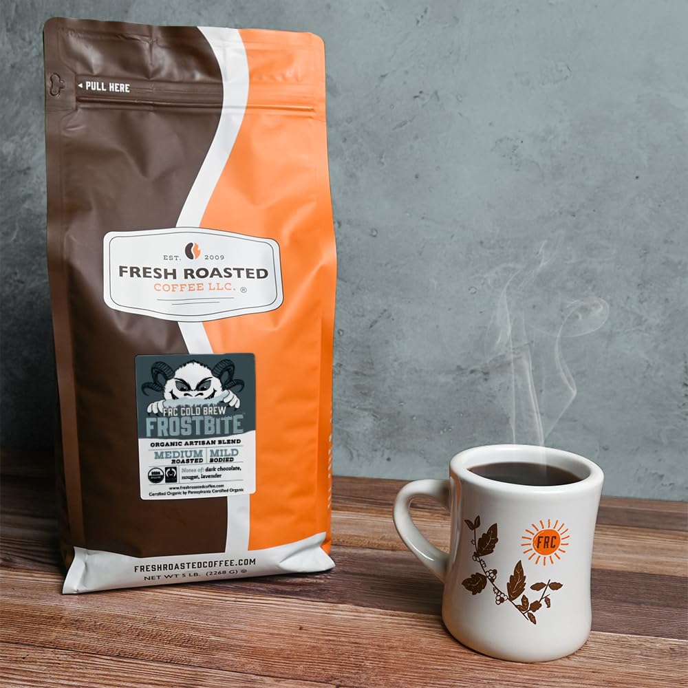 Fresh Roasted Coffee cold brew pitcher in use demonstrating smooth, low-acid beverage