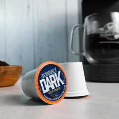 Fresh Roasted Coffee ground beans texture close-up revealing rich chocolate and walnut notes