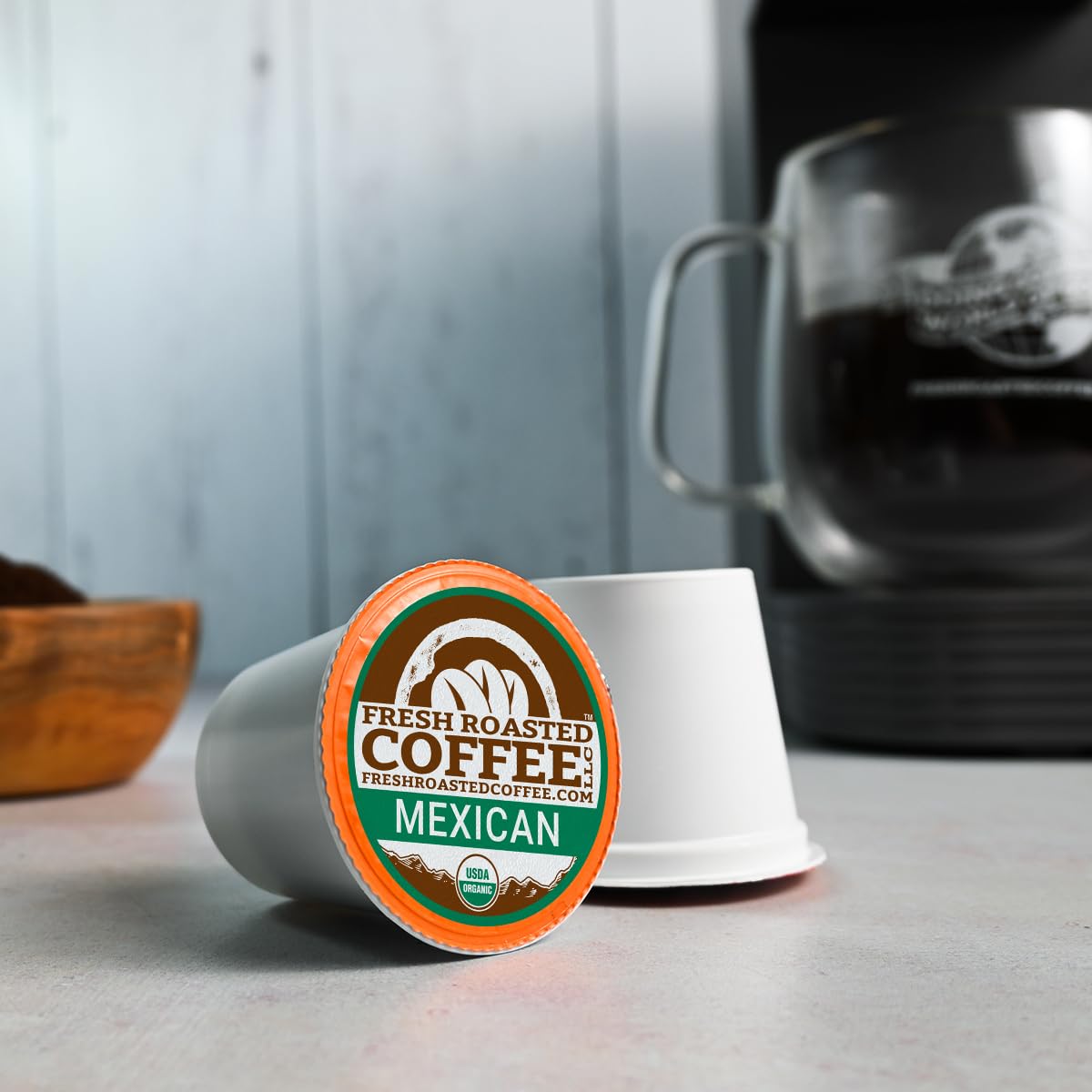 Fresh Roasted Coffee K-Cup in brewer producing a hot cup quickly for convenience