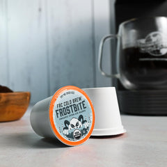Fresh Roasted Coffee cutaway K-Cup exposing grounds to show medium-roast texture and freshness
