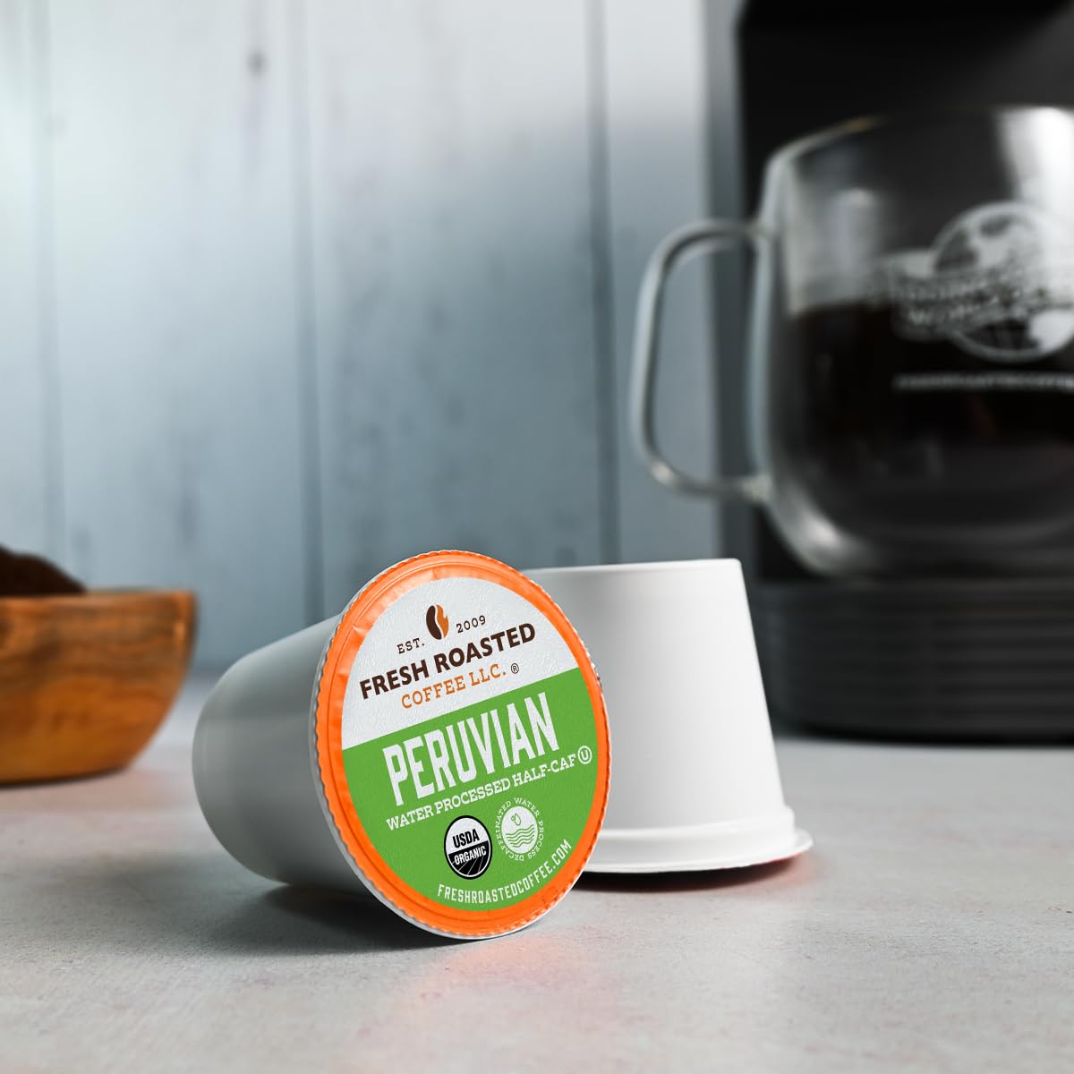Fresh Roasted Coffee K-Cup pod top view indicating medium roast flavor