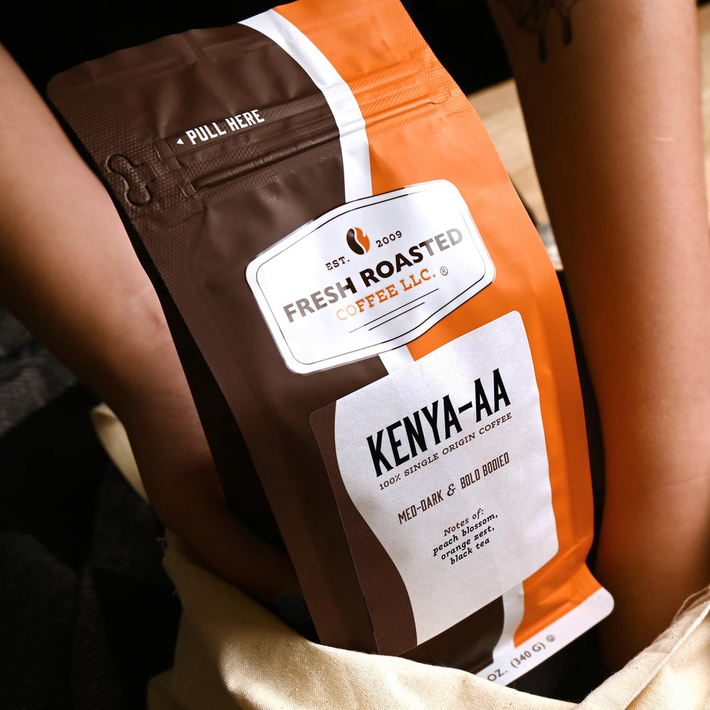 Fresh Roasted Coffee bag beside a 12 oz scale showing package size clarity