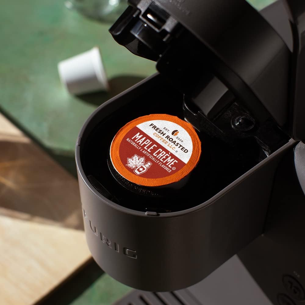 Fresh Roasted Coffee brewed cup with steam highlighting maple crème flavor enjoyment