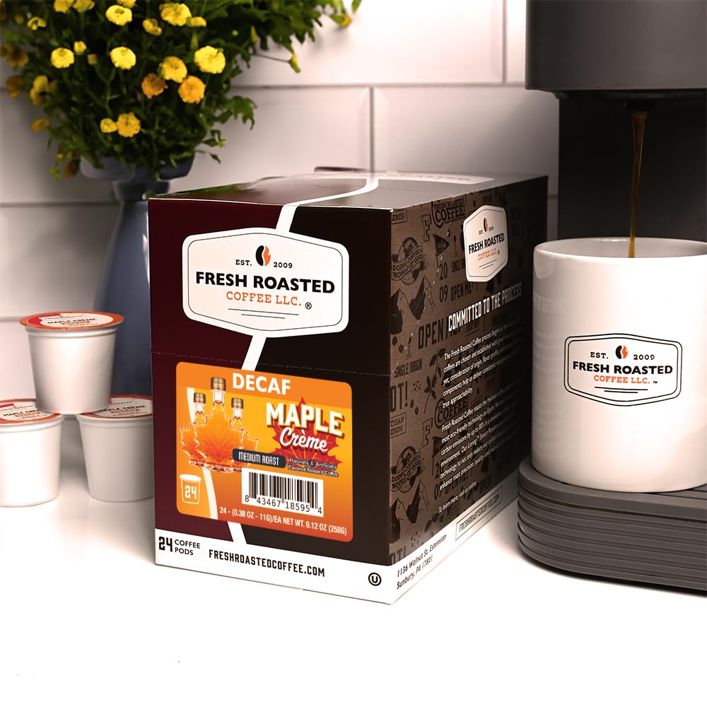 Fresh Roasted Coffee beans beside a pod showing 100% Arabica origin benefit