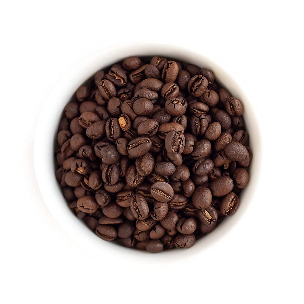 Fresh Roasted Coffee close-up peaberry beans highlighting uniform roast and aroma