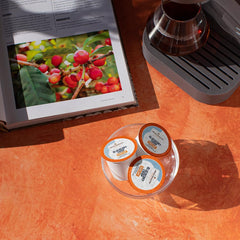 Fresh Roasted Coffee pod inside single-serve brewer producing steam for a fresh cup benefit
