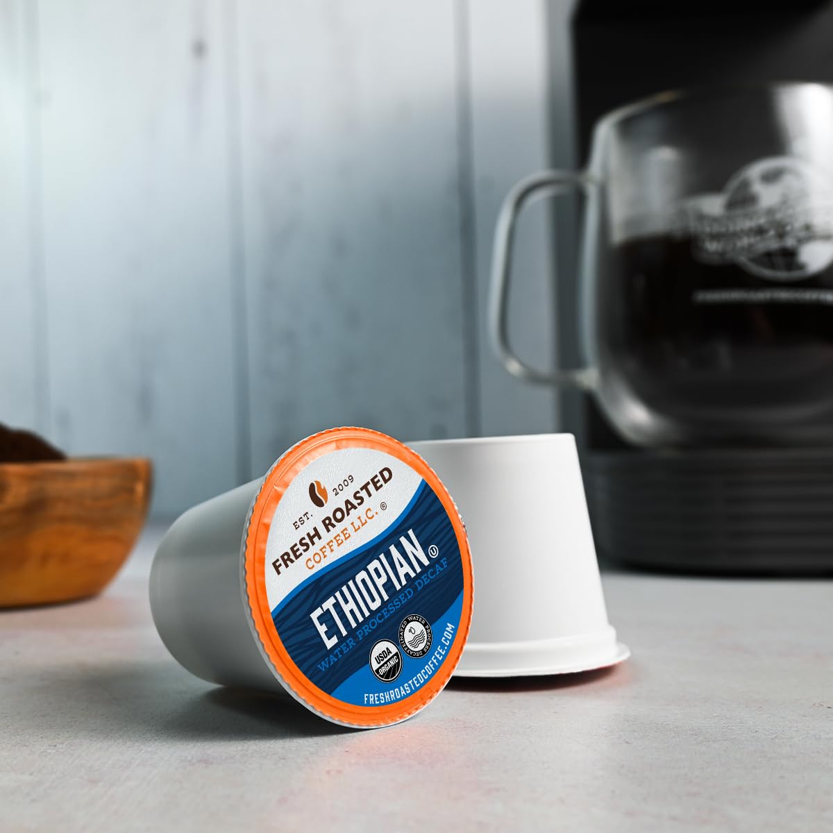 Fresh Roasted Coffee close-up of a single K-Cup pod highlighting pod design