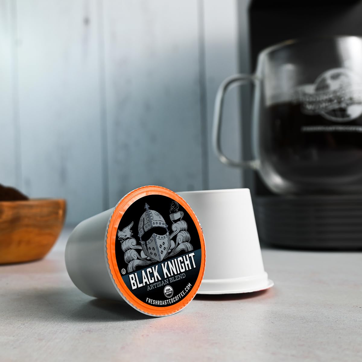 Fresh Roasted Coffee loose pods in a ceramic bowl illustrating portioned single-serve convenience