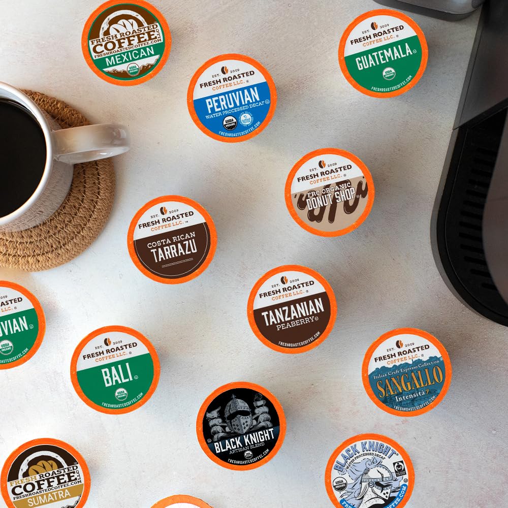 Fresh Roasted Coffee pods spread on table highlighting variety and choice