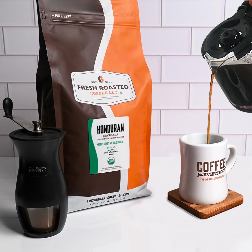 Fresh Roasted Coffee roasting process shot showing eco-friendly roaster and quality control