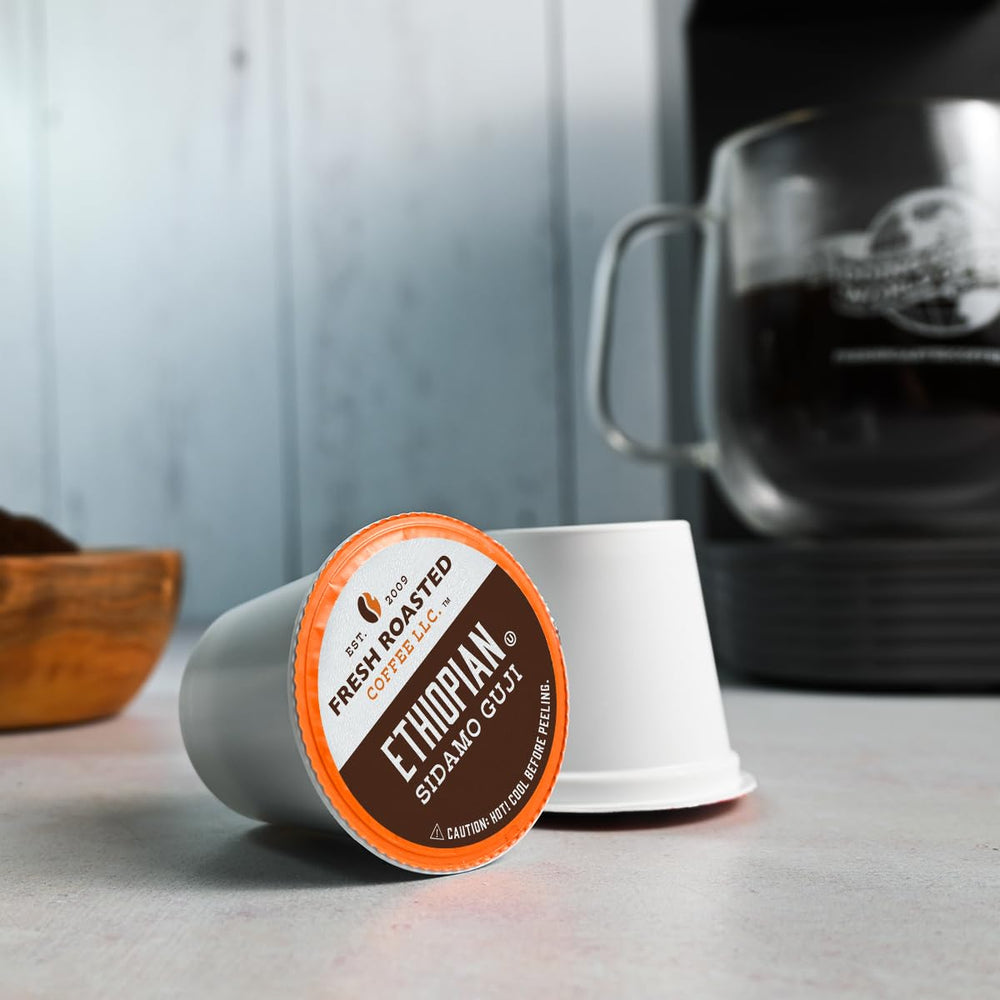 Fresh Roasted Coffee pod next to a ruler showing size and portion scale for storage