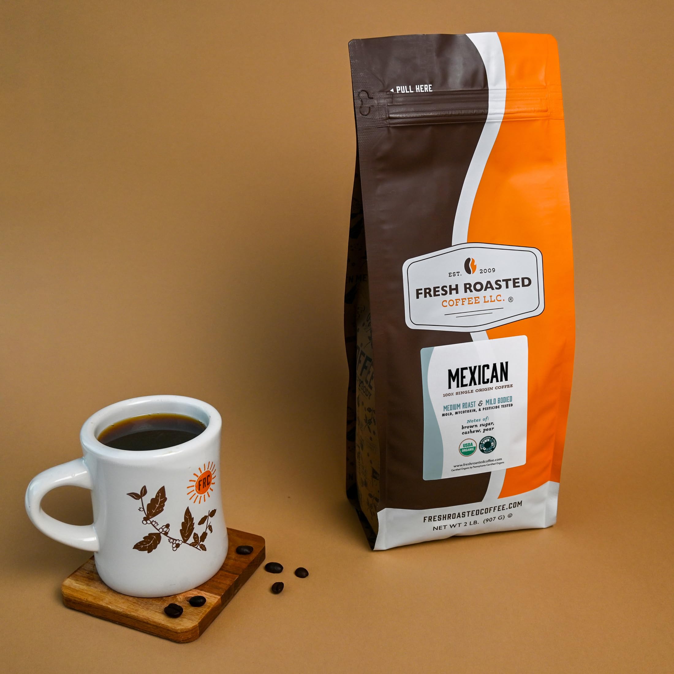 Fresh Roasted Coffee bag next to ruler shows 2 lb scale for portion clarity
