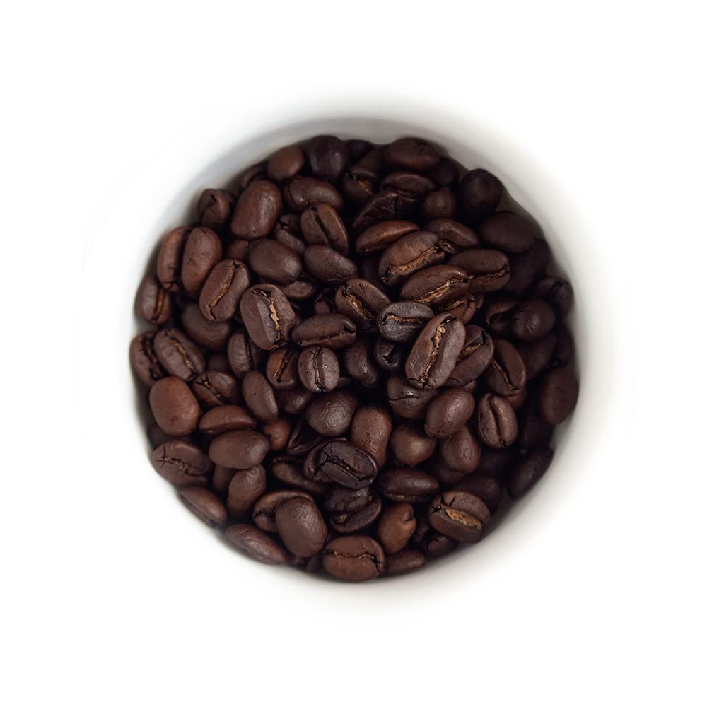 Fresh Roasted Coffee whole beans close-up revealing dark roast and oily sheen